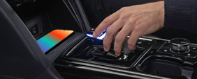 Place your device on the wireless charging pad and press the Start button to start the vehicle.
